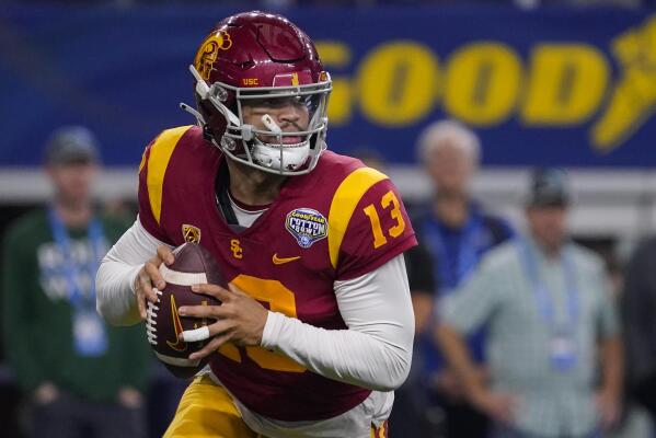 Heisman winner Williams watches decisive score in USC loss AP News